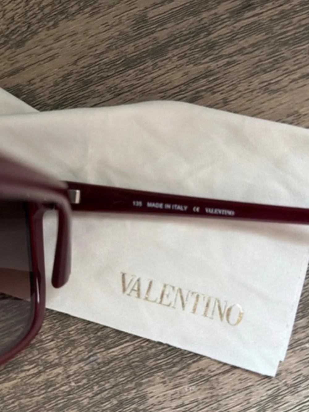 Valentino burgundy icon